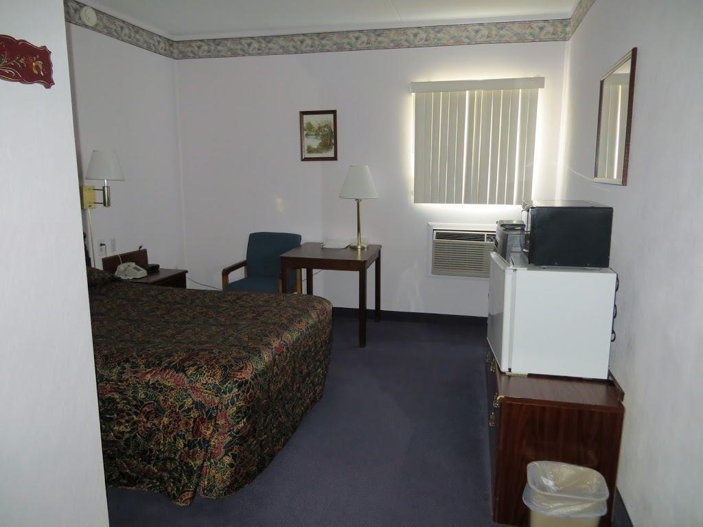 The Bluffs Inn & Suites Декора Номер фото
